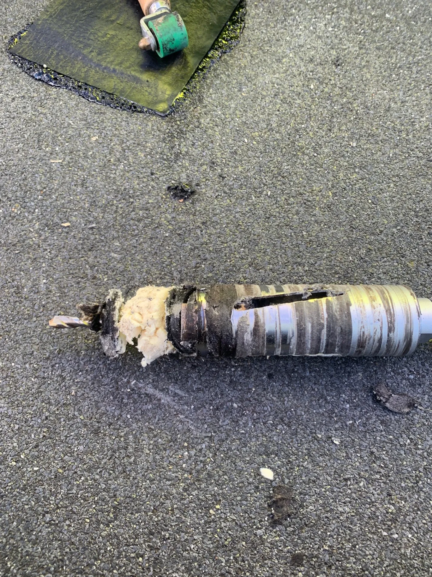 Core sample during Cumbernauld industrial roof appraisal by Modern Roofing