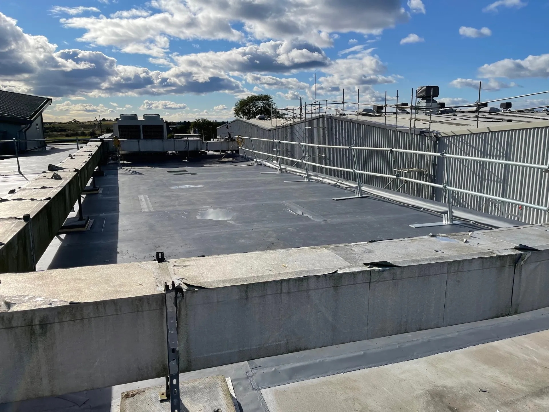 Industrial flat roof refurbishment during installation.
