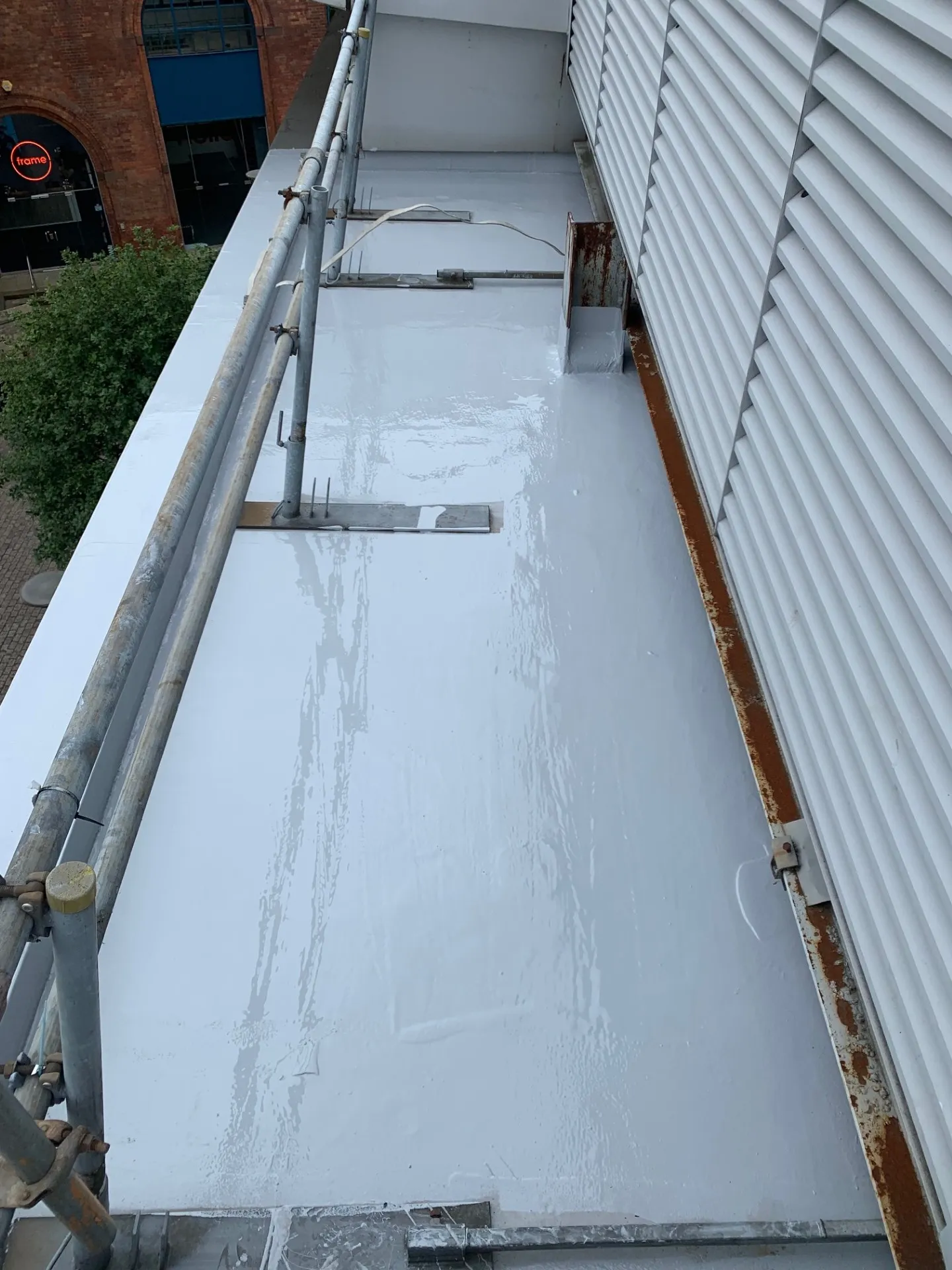 Liquid applied roofing installed in a tight space at a police station