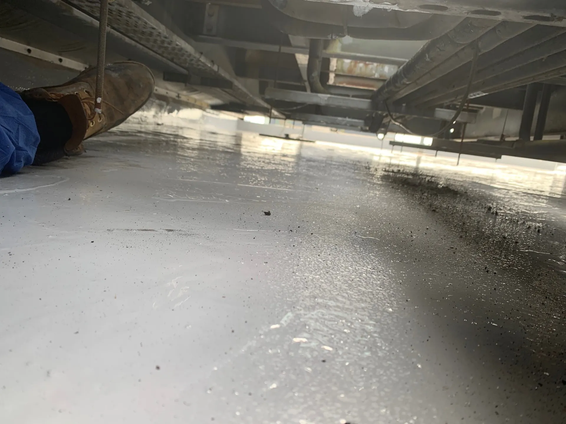 Liquid roofing installation in a tight access area