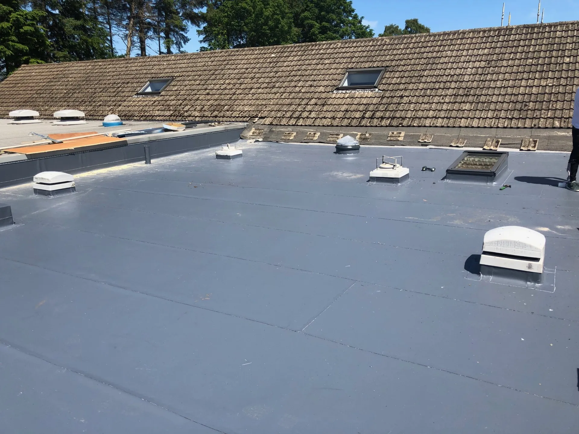 Completed warm roof overlay with single ply membrane at Fairmile Church Edinburgh