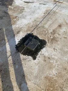 Bitumen contamination on PVC roof affecting bond and compatibility
