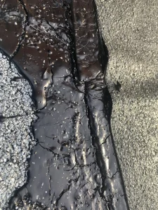 Fish mouth defect in felt roof covering