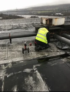 Pull-out test and roof coring during industrial roof survey