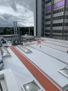 Sarnafil single-ply membrane roof with reinforced maintenance walkway