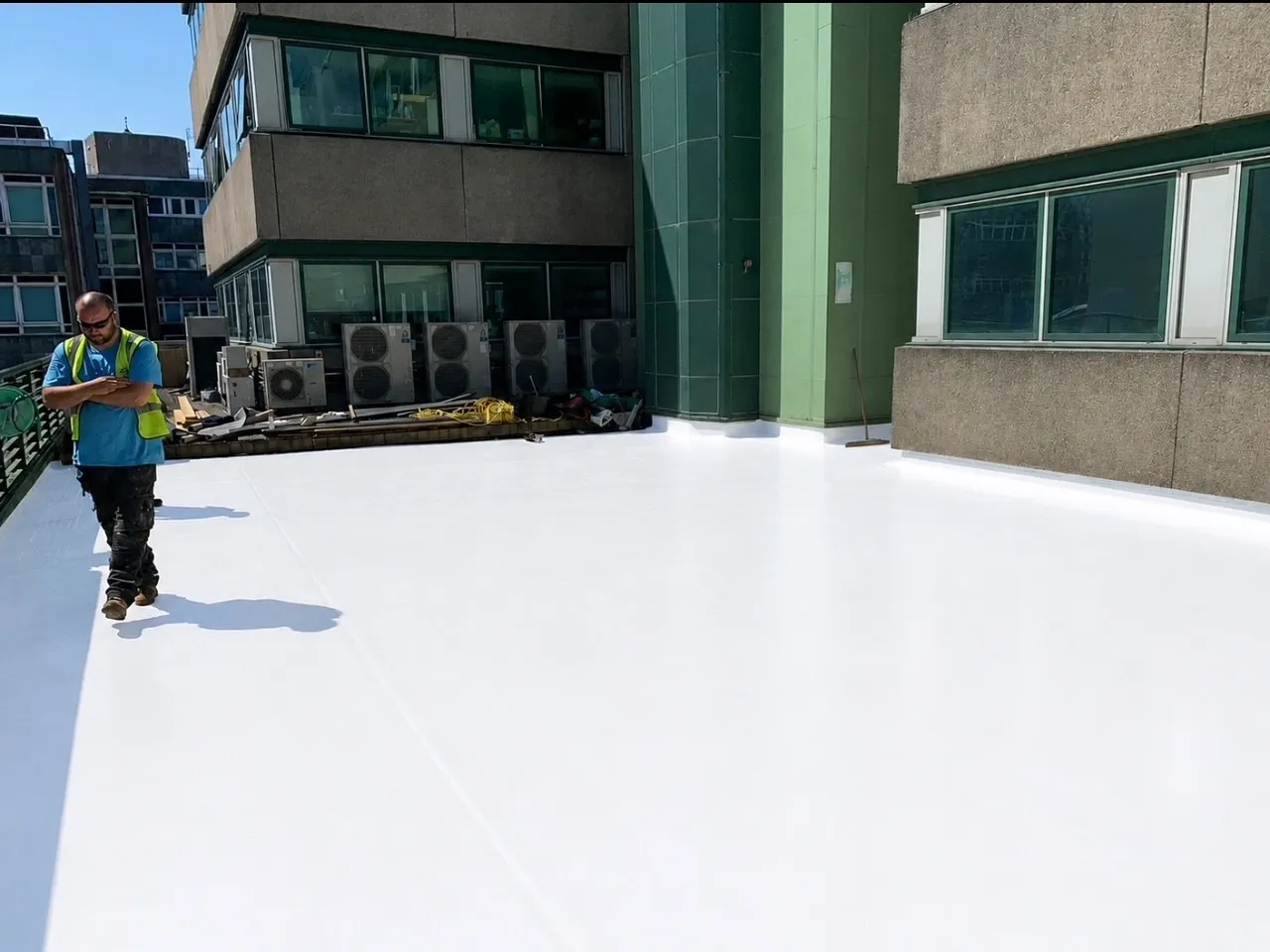 Solar-reflective white membrane installed on a refurbished commercial roof in Glasgow