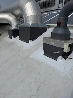 Sika membrane detailing around new roof vents at Calderstone Industrial Products Ltd