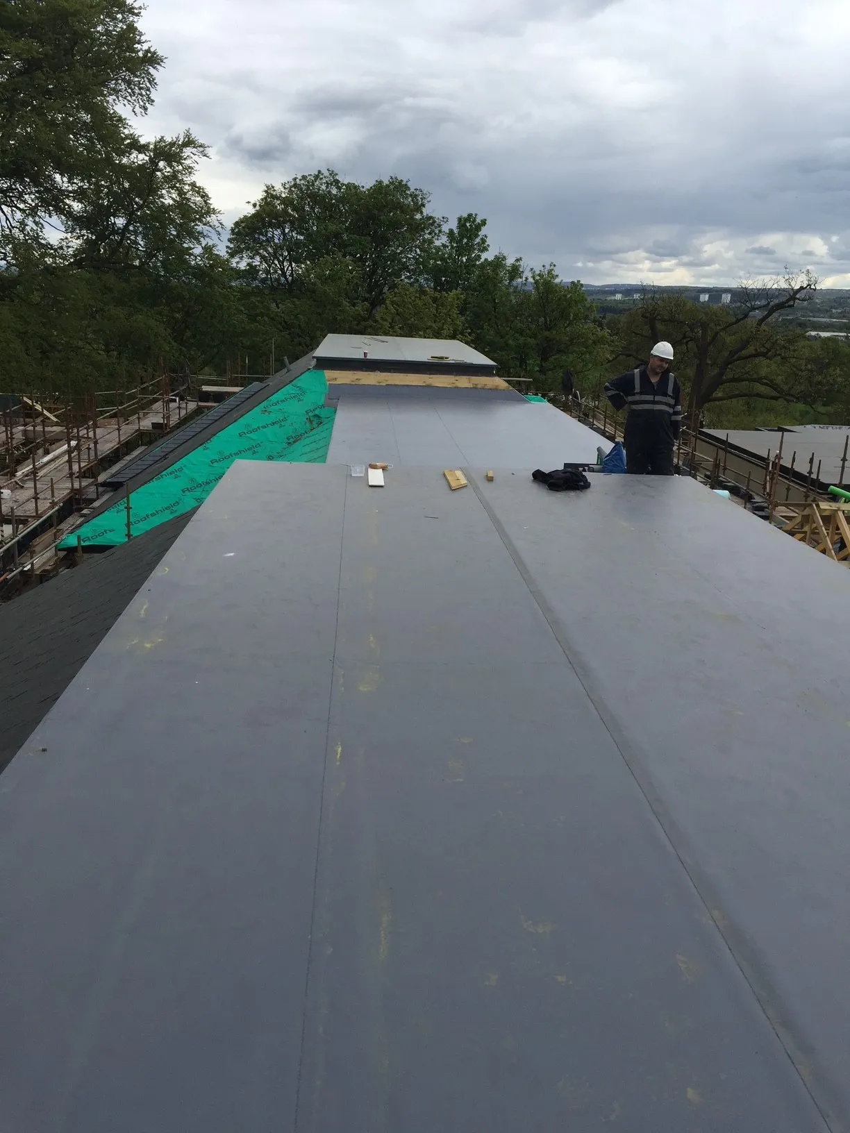 Single ply membrane roofing to a block of flats in Edinburgh