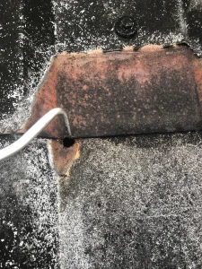 Second cut edge corrosion hole on industrial metal roof
