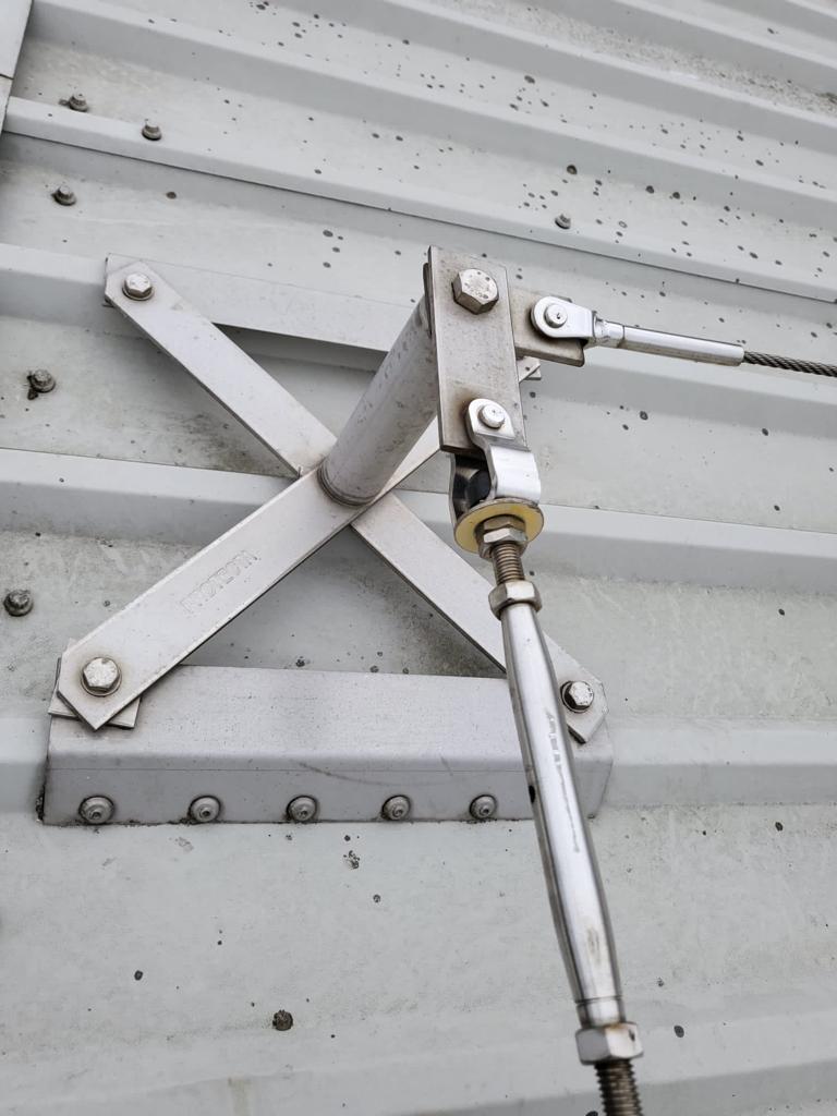 Mansafe roof safety system detail on a commercial roof