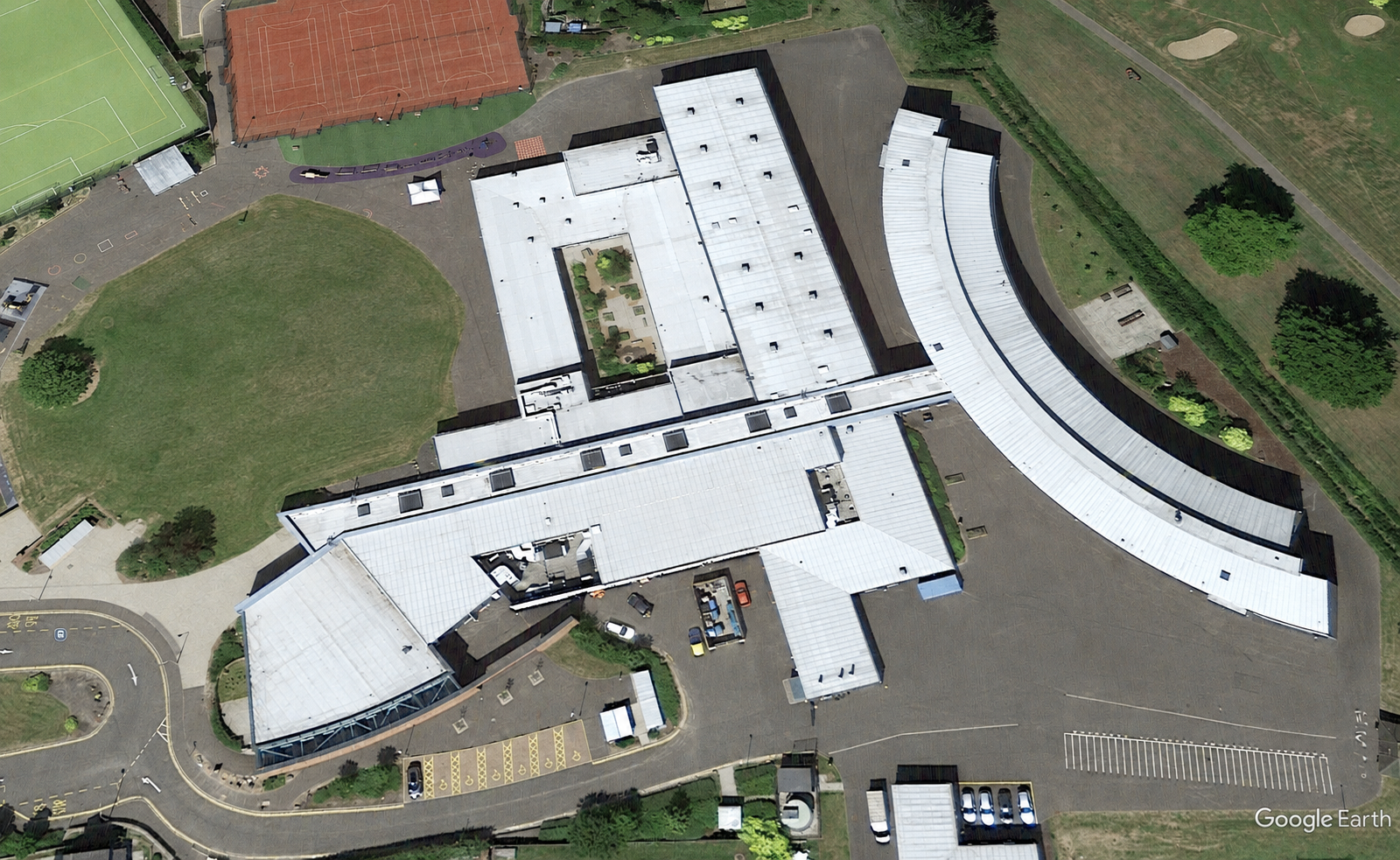 Perth RC Campus roofing project including curved gym hall roof