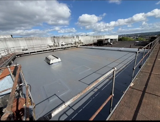 Crane loading materials for 3000m2 Sika membrane roofing project in Edinburgh by Modern Roofing Scotland